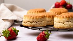 some biscuits and strawberries on a table