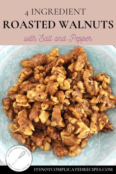 roasted walnuts with salt and pepper in a blue bowl