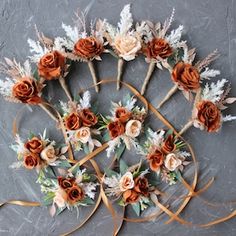 an arrangement of flowers arranged on top of each other