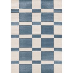 a blue and white rug with squares on it