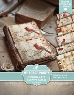 an old book sitting on top of a wooden table next to some papers and scissors