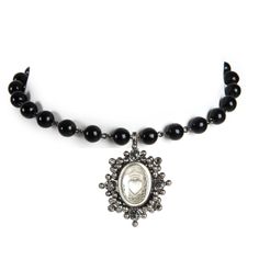 Step into your dark femininity with the Iconic Mystic Black Pearl Choker. Whether you are inspired by the Sacred Heart (a medallion created to inspire divine love) or prefer the protection of San Benito (made to help protect your intuition), the Pearl Choker, made with hand-selected Austrian black pearl crystal beads, is a great way to showcase the beauty of all of our Classic or Luxury Medallions. Black Pearl Necklace, The Sacred Heart, Divine Love, Pearl Crystal, The Pearl, Pearl Choker, Sacred Heart, Beaded Choker, Austrian Crystal