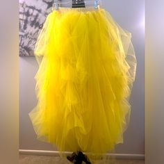 Yellow Tulle Skirt Cotton Lining. Worn Once. Size Xxl. Can Dress Up Or Down. Elastic Waist. Very Stretchy. Yellow Tulle Party Skirt, Yellow Tulle Skirt, Tulle Skirt, Elastic Waist, Womens Skirt, Dress Up, Elastic, Skirt, Yellow