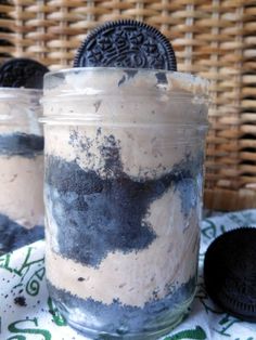 oreo cookies and cream in a jar on a table