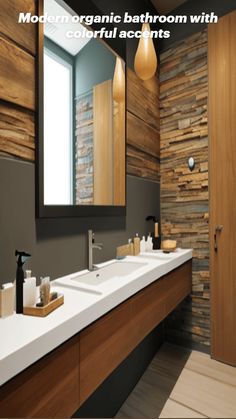 a bathroom with two sinks and a large mirror