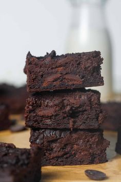 chocolate brownies stacked on top of each other