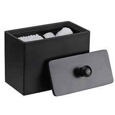 a black box with two toothbrushes in it and a soap dispenser