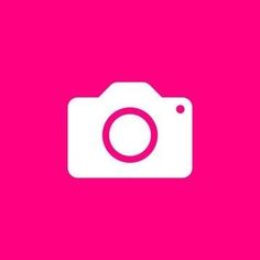 a camera on a pink background