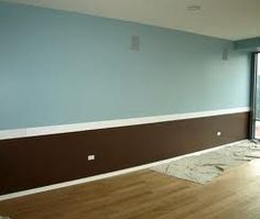 empty room with hard wood flooring and sliding glass doors