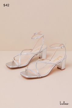 From cute date nights to wedding invites, step out with confidence in the Lulus Makenna Silver Rhinestone Strappy Ankle Strap Low Heel Sandals! These wear-with-anything sandals have a smooth faux leather construction that shapes a trendy square footbed with a slender toe strap and crisscrossing vamp straps. An adjustable ankle strap sprouts from the sides and secures with a shiny silver buckle, all atop a cute block heel. Glittery, dainty rhinestone details throughout lend an extra fabulous fini Silver Sandals With Wrapped Heel For Wedding, Sparkling Block Heel Wedding Sandals, Silver Wedding Sandals With Wrapped Heel, Sparkling Heels For Summer Wedding, Sparkling Summer Wedding Shoes For Prom, Summer Wedding Sparkling Heels, Sparkling Summer Wedding Heels, Sparkling Sandals For Spring Wedding, Sparkling Wedding Shoes For Summer Evening