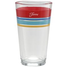 a glass with red, white, and blue stripes on the bottom is shown in front of a white background