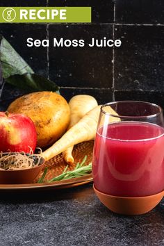 a plate with fruit and vegetables on it next to a glass of juice that reads recipe sea moss juice