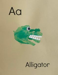 a book with an alligator's face and the letters a to z on it