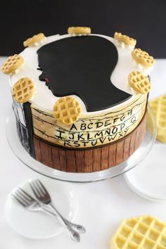 a cake with waffles on it sitting on a table