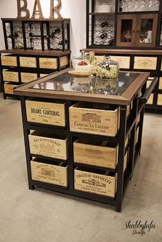 several wine boxes are stacked on top of each other in front of a bar counter