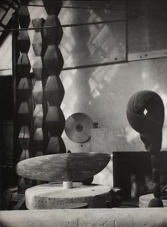 an old black and white photo of some skateboards on display in a store window