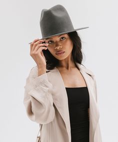 Billie is a bold, tall crown fedora with a short flat brim. Its structured shape provides a comfortable fit + is the ultimate confidence boost for any style moment. Chic Solid Color Panama Hat With Curved Brim, Chic Solid Brimmed Panama Hat, Chic Brimmed Panama Hat For Fall, Modern Fedora Panama Hat For Spring, Modern Flat Brim Fedora For Spring, Modern Spring Fedora With Flat Brim, Spring Modern Fedora With Flat Brim, Modern Flat Brim Hat For Spring, Solid Flat Brim Felt Hat For Spring