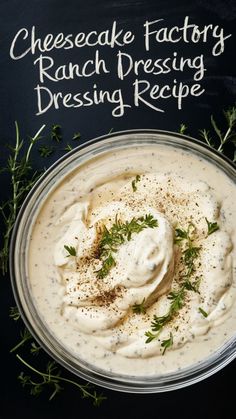 cheesecake factory ranch dressing recipe in a glass bowl with fresh herbs on the side