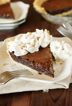 a slice of chocolate pie with whipped cream on top