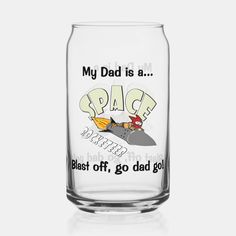 a glass with the words, my dad is a space shuttle blast off, go dad gold