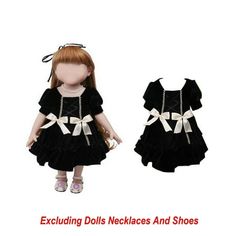 the doll is wearing a black dress with white bows on it's head and shoes