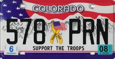 a license plate with an american flag on it