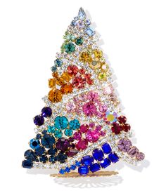 a multicolored crystal christmas tree brooch