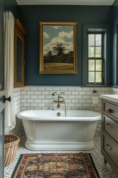 a white bath tub sitting under a window next to a rug