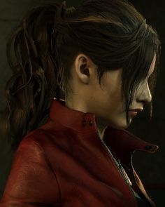 a woman in a red leather jacket looking off into the distance with her hair pulled back