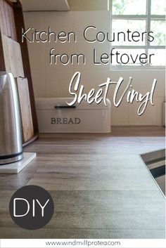 a kitchen counter top with the words, kitchen counters from leftover sheet hung on it