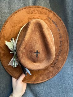 Custom Brown Suede Hat Size 55-57 cm Stiffened brim. Inner Elastic Band. No adjustable strings.  4" Crown Height 3.25" Brim  After ordering, we will send you a message to confirm personalization and to send pictures of your order in case any changes need to be confirmed before shipping.  Each hat is unique and our accessories vary so that no two hats are ever exactly alike. However, we try to match the exact design you choose.  Hand written messages, Branded symbols, Branded letters, Branded numbers can be placed anywhere on the hat for an additional charge of $5 per letter. Please let us know if you'd like to add anything Brown Mini Hats With Flat Brim For Country Events, Brown Panama Hat With Short Brim For Festivals, Brown Short Brim Panama Hat For Festival, Brown Flat Brim Mini Hat For Country Events, Brown Curved Brim Panama Hat For Festival, Country Style Brown Mini Hats With Curved Brim, Country Style Mini Hat With Curved Brim In Brown, Western Style Brown Wide Brim Mini Hat, Brown Flat Brim Panama Hat For Festivals