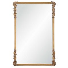 an ornate gold framed mirror on a white background