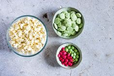 three bowls filled with different types of candy