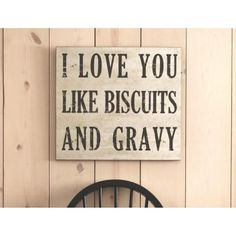 a sign that says i love you like biscuits and gravy on the wall