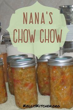 several jars filled with food sitting on top of a counter