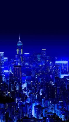 the city is lit up at night with bright blue lights and skyscrapers in the background