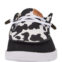 HEYDUDE | Women's Casual | Wendy Animal - Black/cow | Size 6 - Complete with a comfy flexible outsole, eye-catching elastic laces with metallic pop on the end, the Wendy Animal takes you from office to adventure.Shoe Specs:Canvas top Elastic laces Lightweight outsole Flexible outsole Easy-on system Travel ready Removable foam insole Women's Casual Shoes, Wendy Animal - Black/Cow, Hey Dude, HEYDUDE | Women's Casual | Wendy Animal - Black/cow | Size 6 Heydude Shoes, Straight Leg Cargo Pants, School Uniform Shoes, School Uniform Kids, Women's Casual Shoes, Affordable Shoes, Black Cow, Sandal Platform, Most Comfortable Shoes