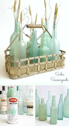 some bottles are sitting in a basket and one is filled with sea glass, the other has