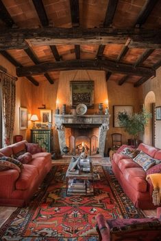 a living room filled with furniture and a fire place in the middle of a room