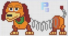 a cross stitch pattern of a dog with a flower in its mouth and the letter p on it