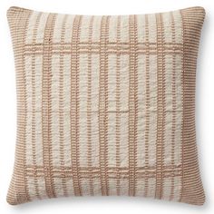 a beige and white pillow with brown lines on it's side, against a white background