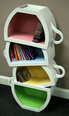 three bookshelves stacked on top of each other