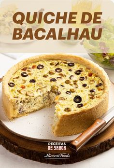 a quiche de bacalhau on a plate with a knife