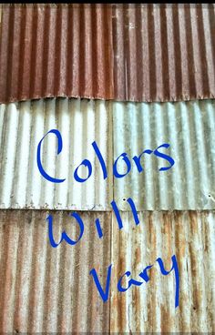 the words colors with very are written in blue ink on an old corrugated roof that is rusted