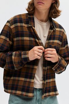 Long sleeve button-down flannel shirt by UO’s own BDG label. Cropped fit plaid pattern collared shirt with a left chest pocket. Find this cotton flannel shirt only at Urban Outfitters. Features BDG cropped plaid flannel shirt Long sleeve button-down shirt Cotton flannel shirt with a plaid pattern Standard collar Long sleeves Boxy fit Cropped length Content + Care 100% Cotton Machine wash Imported Size + Fit Model in Blue Multi is 6’1" and wearing size Medium Measurements taken from size Medium C Vintage Flannel Outfits Men, Orange Flannel Outfit Men, Oversized Flannel Outfits Men, Men’s Flannel, Plaid Shirt Outfits Men, Mens Flannel Shirt Outfit, Mens Granola Style, Vintage Flannel Outfits, Layered Flannel Outfit