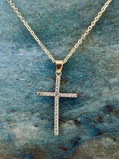 Upgrade your style with the Cubic Zirconia Cross Necklace, a stunning piece of jewelry that exudes both elegance and faith. This exquisite cross necklace features a delicate gold-plated cross adorned with shimmering cubic zirconia stones, creating a dazzling and eye-catching design. Crafted with meticulous attention to detail, the Crystal Stevie Cross Necklace is a testament to exceptional craftsmanship. The high-quality materials used ensure durability and long-lasting beauty, making it a cheri Cross Necklace For Women, Crucifix Necklace, Sterling Silver Cross Necklace, Sterling Silver Cross Pendant, Silver Cross Pendant, Religious Cross, Christmas Cross, Sterling Silver Cross, Cross Pendant Necklace