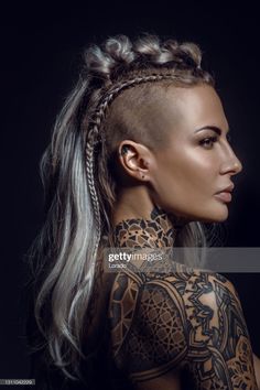 Stock Photo : Side portrait of a tattooed viking blonde female and her unique hairstyle Blonde Female, Braids With Shaved Sides, Viking Braids, Side Portrait, Half Shaved Hair, Shaved Side Hairstyles, Half Shaved, Viking Women