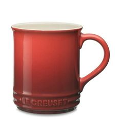 a red coffee mug with the word be cruiset on it's side