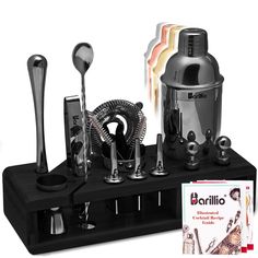 an assortment of kitchen utensils are displayed on a black stand with brochures