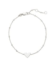 So dainty, and oh-so-lovely, the Ari Heart Delicate Bracelet in Sterling Silver is a sweetheart addition to your core collection, a go-to for romantic stacks or simple stand-alone styles. Adjustable Delicate Sterling Silver Heart Bracelet, Delicate Silver Bracelets With Heart Charm, Dainty Sterling Silver Bracelets For Valentine's Day, Adjustable Dainty Chain Bracelet With Heart Charm, Delicate Sterling Silver Heart Bracelets, Delicate Everyday Bracelet With Heart Charm, Delicate Everyday Bracelets With Heart Charm, Dainty Sterling Silver Chain Bracelet For Valentine's Day, Delicate Sterling Silver Heart Bracelet